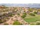 Community view showcasing lush landscaping and a well-manicured golf course at 32 Cerchio Basso, Henderson, NV 89011