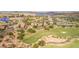 Community aerial view showcasing lush landscaping, elegant homes, and the scenic golf course at 32 Cerchio Basso, Henderson, NV 89011