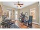 Bonus room with a ceiling fan, wood floors, and exercise equipment, providing a dedicated workout space at 32 Cerchio Basso, Henderson, NV 89011