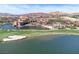 Resort community with lake, golf course, landscaping, mountains and beautifully-designed homes at 32 Cerchio Basso, Henderson, NV 89011