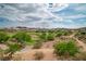 Scenic golf course view showcasing lush landscaping, mature trees, and desert foliage at 32 Cerchio Basso, Henderson, NV 89011