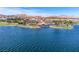 Beautiful lake view with golf course and building architecture on the other side of the water at 32 Cerchio Basso, Henderson, NV 89011