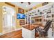 Bright home office featuring custom cabinetry, natural light, and modern decor at 32 Cerchio Basso, Henderson, NV 89011