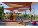 Fun community park featuring a playground and shaded seating areas at 3434 Oristano Ln, Henderson, NV 89044