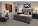 Comfortable main bedroom with modern decor and a plush queen-sized bed at 3434 Oristano Ln, Henderson, NV 89044