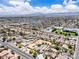 A high-altitude view of the property featuring an in-ground pool and a desert landscape at 3845 S Torrey Pines Dr, Las Vegas, NV 89103
