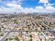 An elevated view of the property with a camping trailer set in a grid of homes, pools, and streets at 3845 S Torrey Pines Dr, Las Vegas, NV 89103