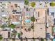 A bird's eye view of the property featuring an in-ground pool, a camping trailer, and a wide-open lot at 3845 S Torrey Pines Dr, Las Vegas, NV 89103