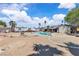 Wide open backyard featuring an in-ground pool, a grill, mature trees, and a camping trailer at 3845 S Torrey Pines Dr, Las Vegas, NV 89103