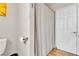Bathroom featuring shower with light-striped curtain and white walls at 3845 S Torrey Pines Dr, Las Vegas, NV 89103