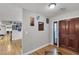 Entryway with dark wood door, light walls, and wood floors at 3845 S Torrey Pines Dr, Las Vegas, NV 89103