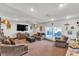 Spacious living room with comfortable seating and a large TV screen at 3845 S Torrey Pines Dr, Las Vegas, NV 89103