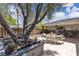 Relaxing outdoor patio area with lush trees and comfortable seating at 3845 S Torrey Pines Dr, Las Vegas, NV 89103