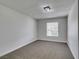 Cozy bedroom with neutral paint and natural light at 4393 Swandale Ave, Las Vegas, NV 89121