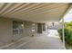 Attached carport providing covered parking and protection from the elements, with a view to the backyard at 4393 Swandale Ave, Las Vegas, NV 89121