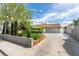 Charming single-story home with mature landscaping, a driveway, and a well-maintained front yard at 4393 Swandale Ave, Las Vegas, NV 89121