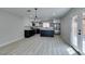 Modern kitchen with stainless steel appliances, a center island, and lots of natural light at 4393 Swandale Ave, Las Vegas, NV 89121