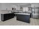 Well-lit kitchen with modern appliances and white cabinets at 4393 Swandale Ave, Las Vegas, NV 89121