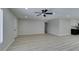 Large living room area with modern finishes and neutral color palette at 4393 Swandale Ave, Las Vegas, NV 89121