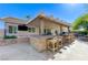 Outdoor bar area with seating and overhead lighting, perfect for outdoor gatherings at 444 Flores Cir, Las Vegas, NV 89123