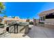 Backyard with a built-in hot tub and lush landscaping, creating a private oasis at 444 Flores Cir, Las Vegas, NV 89123