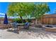 Relax in this backyard with its outdoor seating area and fire pit at 444 Flores Cir, Las Vegas, NV 89123