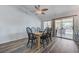 Dining room featuring a dining table with seating for six and sliding glass door access to the backyard at 444 Flores Cir, Las Vegas, NV 89123