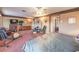Large bedroom offers natural light, a ceiling fan, and space for exercise equipment at 4471 Borrego Springs Way, Las Vegas, NV 89129