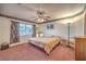 Bedroom with simple decor and large window for natural light at 4471 Borrego Springs Way, Las Vegas, NV 89129