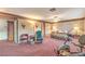 Spacious bedroom featuring lots of room, a ceiling fan, and exercise equipment at 4471 Borrego Springs Way, Las Vegas, NV 89129