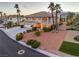 Beautiful two-story home with a well-manicured lawn, three-car garage, and lush landscaping at 4471 Borrego Springs Way, Las Vegas, NV 89129