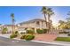 Charming two-story home with mature landscaping, three-car garage, and beautiful red rock accents at 4471 Borrego Springs Way, Las Vegas, NV 89129