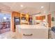 Bright kitchen featuring wood cabinets, white tile countertops, and stainless steel appliances at 4471 Borrego Springs Way, Las Vegas, NV 89129