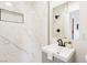 Modern bathroom featuring updated vanity and a beautifully tiled walk-in shower, offering a spa-like experience at 4471 Wisconsin Ave, Las Vegas, NV 89104