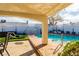 Relaxing backyard with a pool, spa, and comfortable lounge chairs, surrounded by well-maintained landscaping at 4471 Wisconsin Ave, Las Vegas, NV 89104