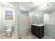 Cozy bathroom features a toilet, vanity, and a shower-tub combo, all with a calming ambiance at 4846 Lone Grove Dr, Las Vegas, NV 89139