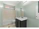 Well-lit bathroom featuring a vanity, toilet, and tub with shower, all in a clean design at 4846 Lone Grove Dr, Las Vegas, NV 89139