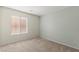 Cozy bedroom with carpet, neutral walls, and a bright window offering natural light at 4846 Lone Grove Dr, Las Vegas, NV 89139