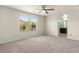 Bedroom with neutral walls and carpet, features an en-suite bathroom at 4846 Lone Grove Dr, Las Vegas, NV 89139