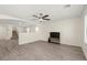 Living room showcasing an open floor plan, light walls, and luxury vinyl plank flooring at 4846 Lone Grove Dr, Las Vegas, NV 89139