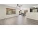 Open living space showcasing light walls, luxury vinyl plank flooring, and natural light at 4846 Lone Grove Dr, Las Vegas, NV 89139