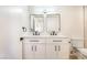 Modern bathroom featuring a double vanity, sleek black hardware, and a bright, clean design at 4848 Fuentes Cir, Las Vegas, NV 89121