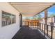 Cozy covered patio perfect for relaxation and enjoying the outdoors, featuring black railing at 4848 Fuentes Cir, Las Vegas, NV 89121