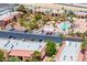 Aerial view of a gated community with a pool, landscaping, and covered parking at 4980 Indian River Dr # 447, Las Vegas, NV 89103