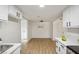 Modern kitchen featuring stainless steel appliances and white cabinetry at 4980 Indian River Dr # 447, Las Vegas, NV 89103