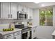 Modern kitchen featuring stainless steel appliances, sleek cabinetry, and ample counter space at 4980 Indian River Dr # 447, Las Vegas, NV 89103