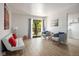 Living room with modern furniture, wood floors and natural light at 4980 Indian River Dr # 447, Las Vegas, NV 89103