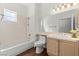 Bright bathroom featuring a bathtub and a large mirror at 5250 S Rainbow Blvd # 1029, Las Vegas, NV 89118