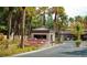 Attractive guard house surrounded by colorful flowers and mature palm trees at 5250 S Rainbow Blvd # 1029, Las Vegas, NV 89118