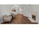 View of the open living room with a fireplace and wood flooring at 5250 S Rainbow Blvd # 1029, Las Vegas, NV 89118